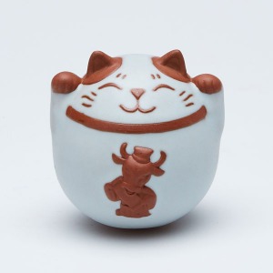 The lucky cat, the twelve gods, the cow.
