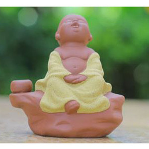 a meditating doll